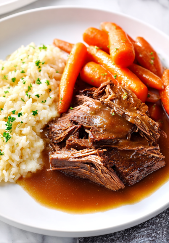Ein Plate mit Rice, Carrots und Steak.